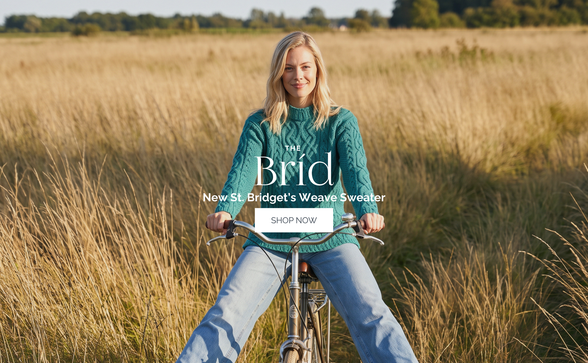 Woman on a bicycle in an Aran Sweater