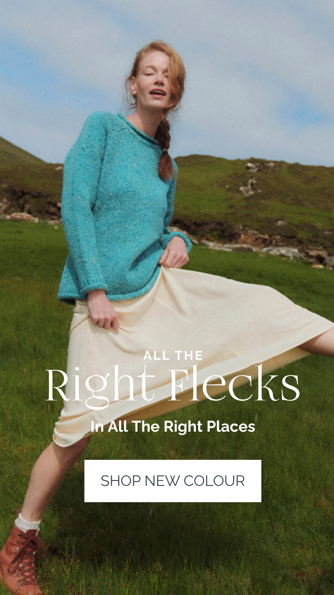 Woman in a our NEW Donegal Tweed Sweater in Aqua Blue
